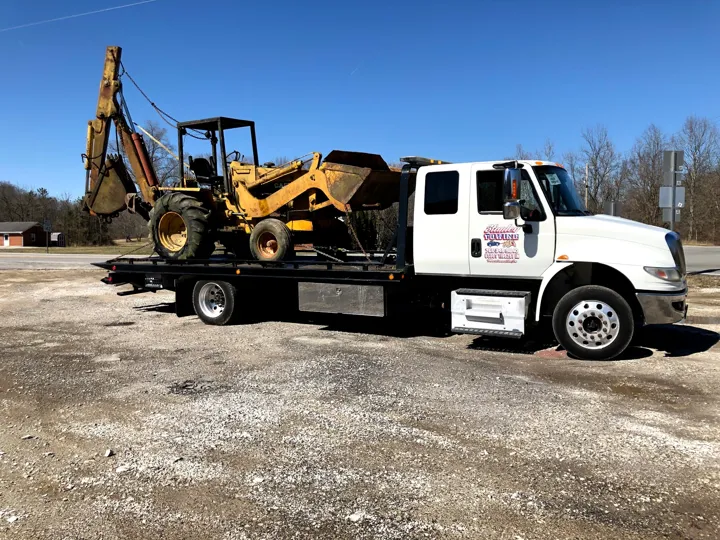 Stanley Towing Inc & Woody's Auto Repair Inc